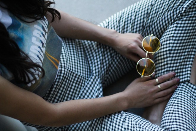 gingham pants and sunglasses